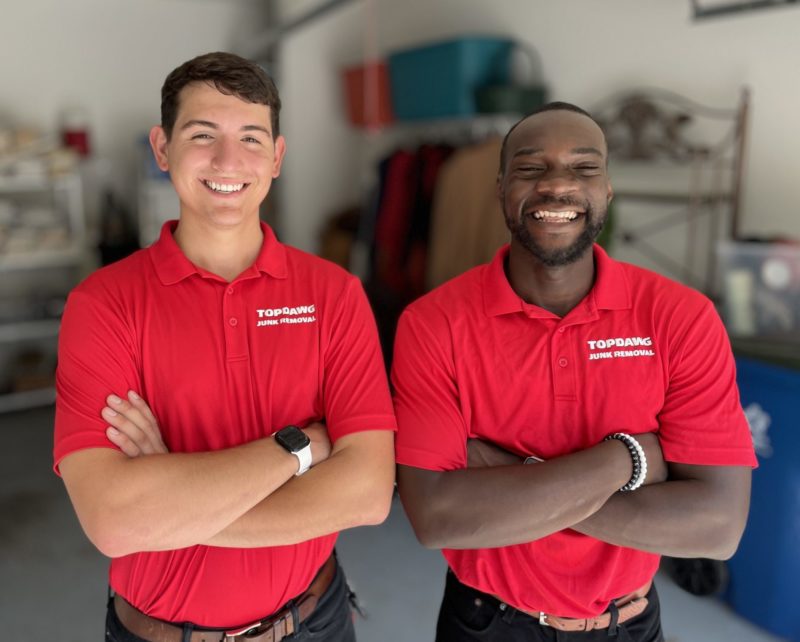 Junk removal pros smiling