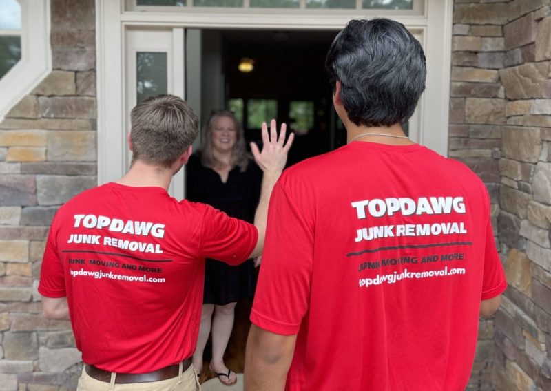 topdawg junk removal crew greeting customer